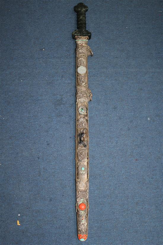 A Chinese jadeite, coral and hardstone mounted silver sword, early 20th century, total length 90cm.